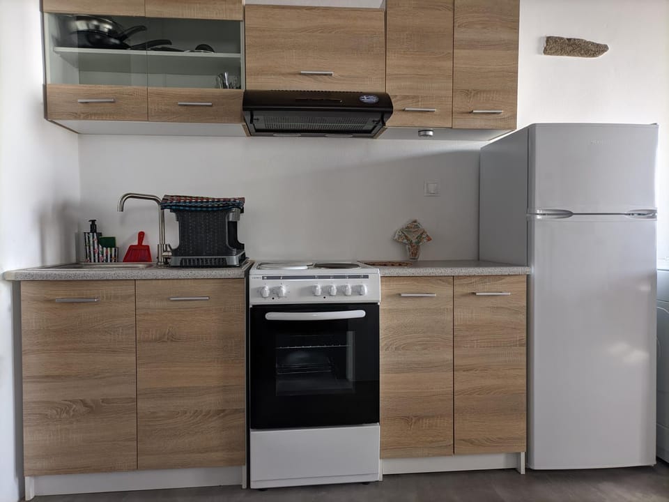 Kitchen or kitchenette, stove