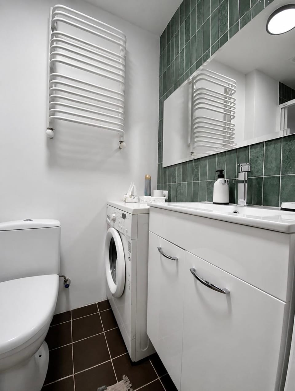 Toilet, towels, washing machine, dryer