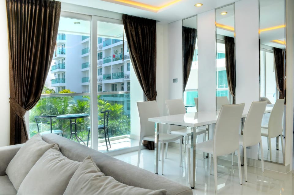 Living room, Photo of the whole room, Decorative detail, Seating area, Dining area, Pool view