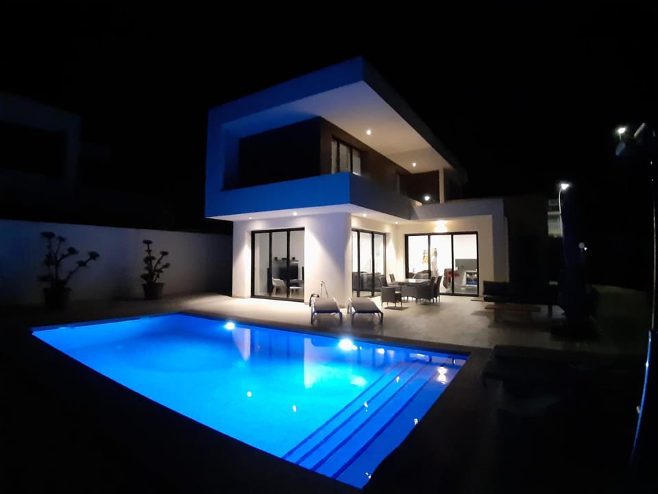 Property building, Night, Swimming pool
