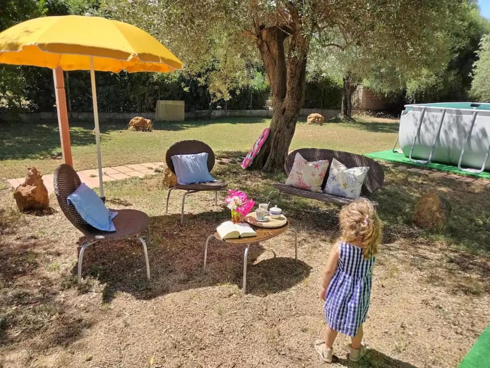 Alghero Guest House, Oasi tra gli Ulivi con Piscina e Fresche Suites in Seminterrato Apartment in Sardinia