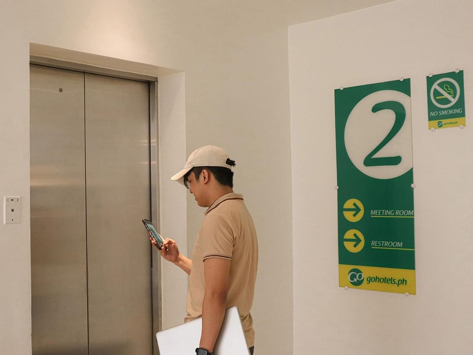 Property logo or sign, elevator