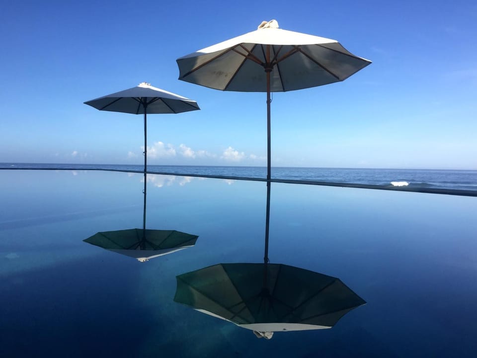Property building, Patio, Activities, Bird's eye view, Fishing, Garden, Snorkeling, Balcony/Terrace, Lounge or bar, Decorative detail, Beach, Diving, Communal kitchen, Garden view, Landmark view, Sea view, Swimming pool, Sports, Entertainment