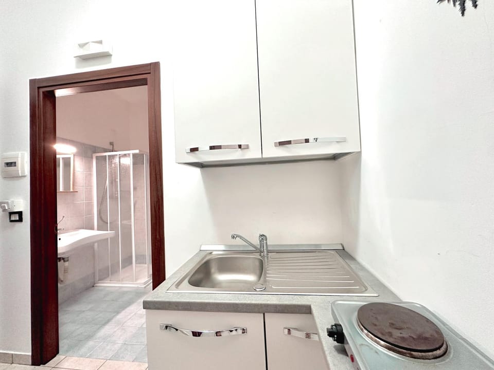 Kitchen or kitchenette, stove
