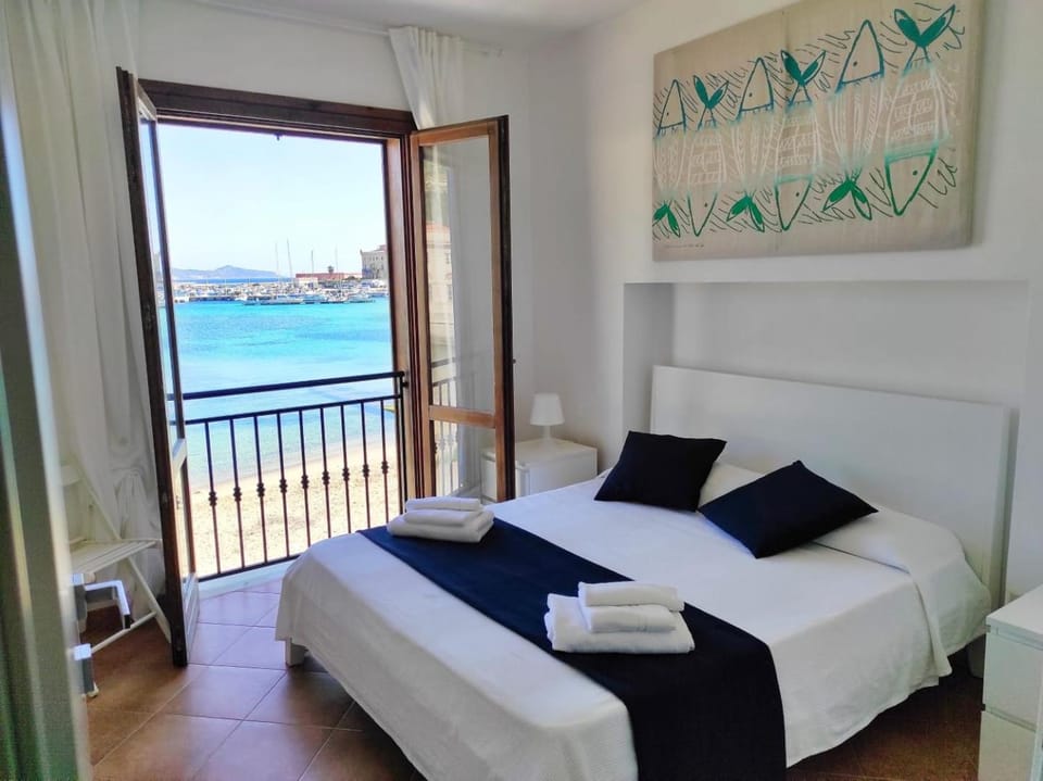 Bed, Natural landscape, View (from property/room), Photo of the whole room, Beach, Bedroom, Sea view