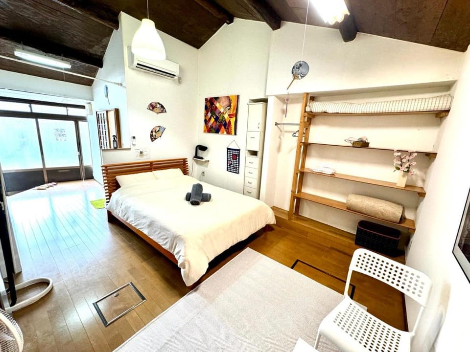 Photo of the whole room, Bedroom, towels, air conditioner