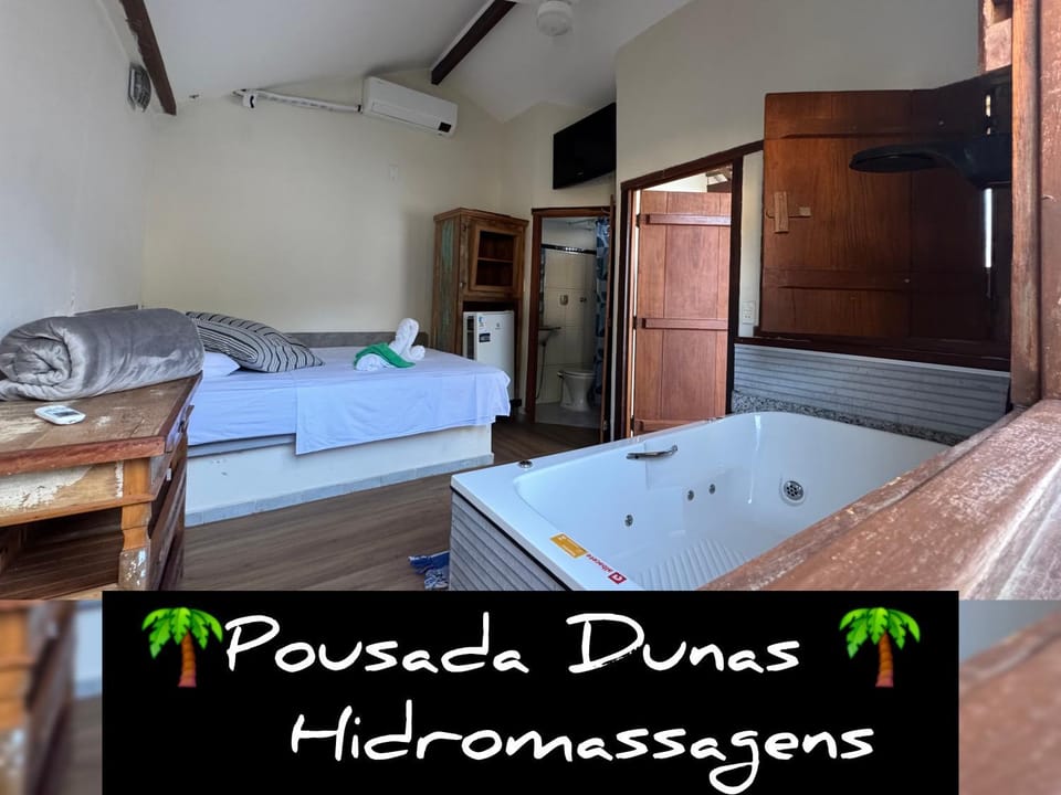 Pousada Dunas - Suítes com HIDROMASSAGEM no coração da Vila Campground/ 
RV Resort in State of Espírito Santo, Brazil