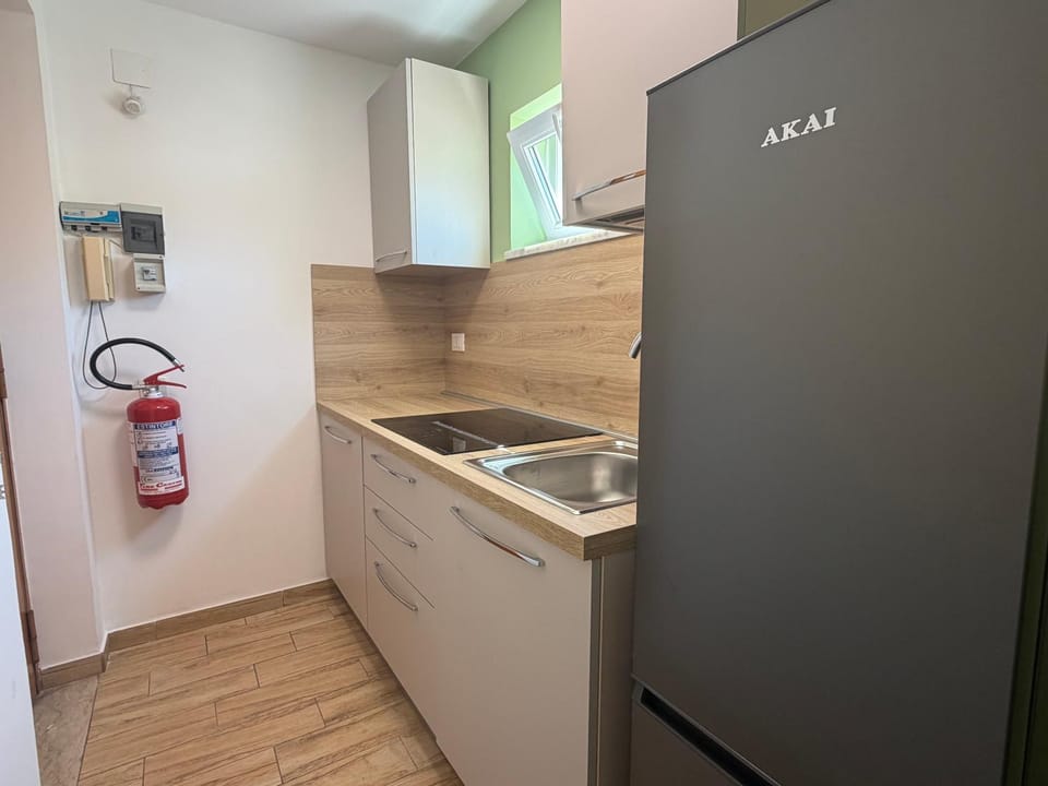 Kitchen or kitchenette, stove