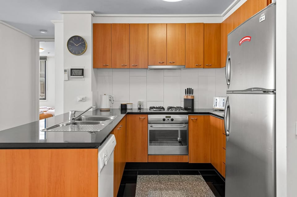 Kitchen or kitchenette, dishwasher, stove