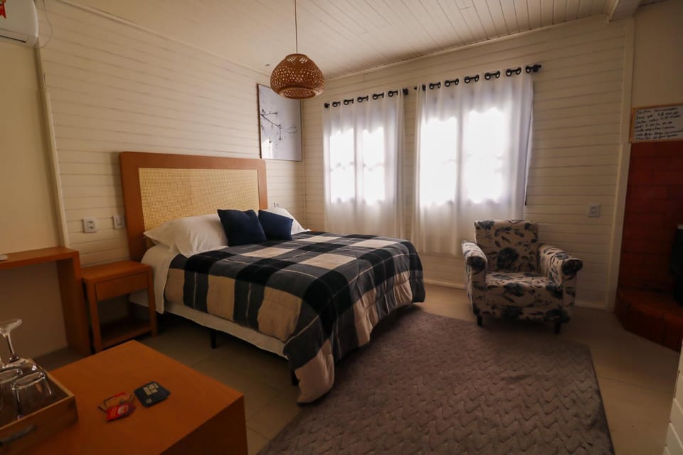 Bed, Living room, Photo of the whole room, Seating area, Bedroom