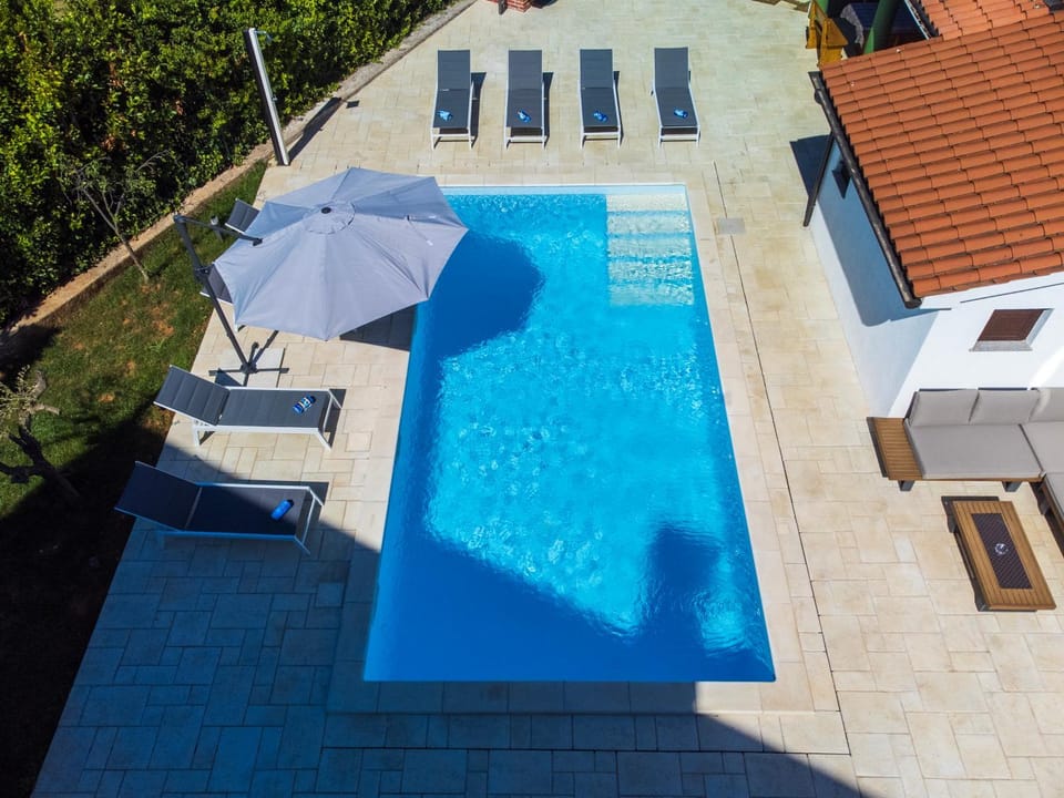 Patio, Day, Pool view, Swimming pool, sunbed