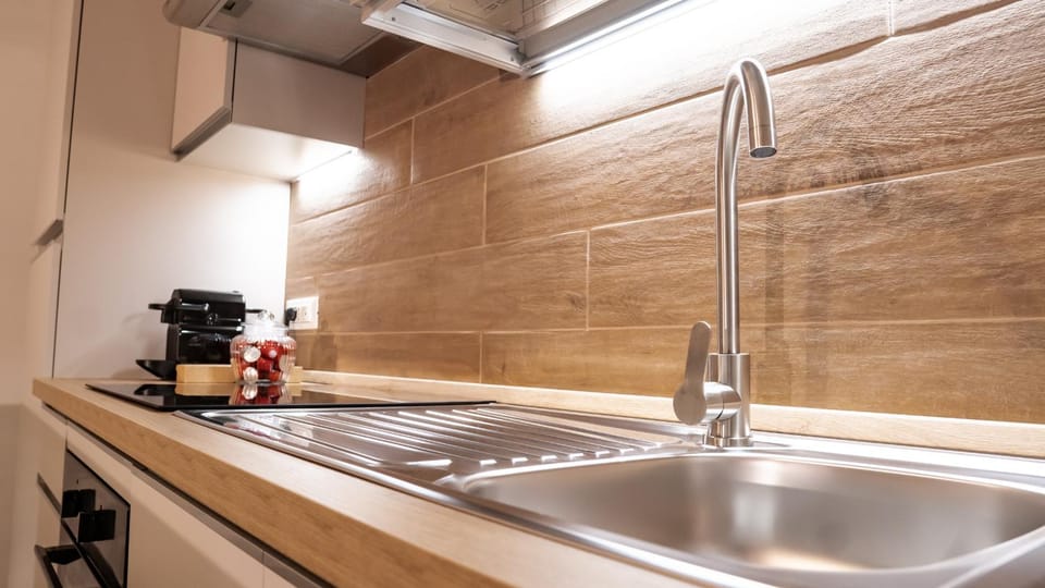 Kitchen or kitchenette, stove
