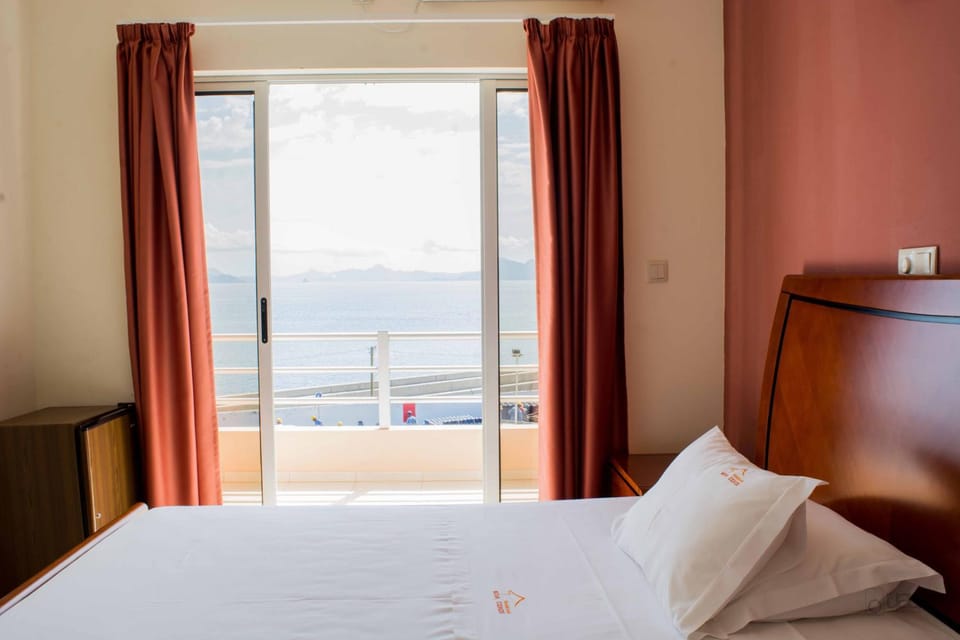 Bed, Natural landscape, Bedroom, Sea view