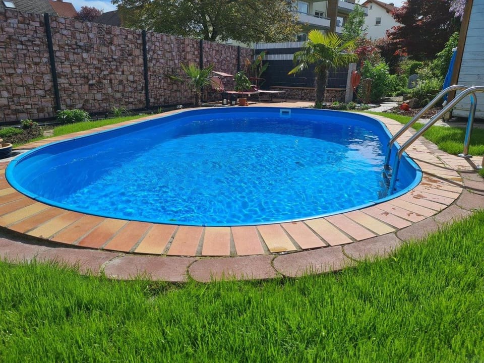 Property building, Living room, Swimming pool