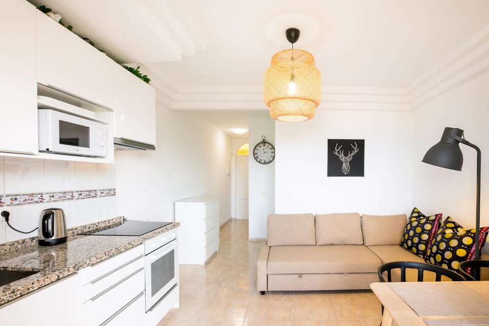 Kitchen or kitchenette, Living room, Seating area, Dining area