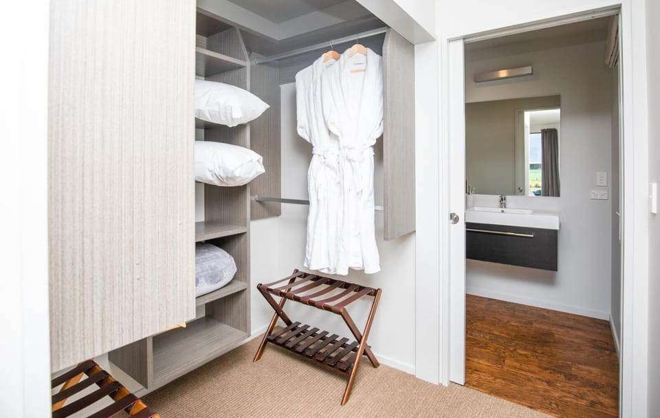 Bed, Bathroom, towels, wardrobe