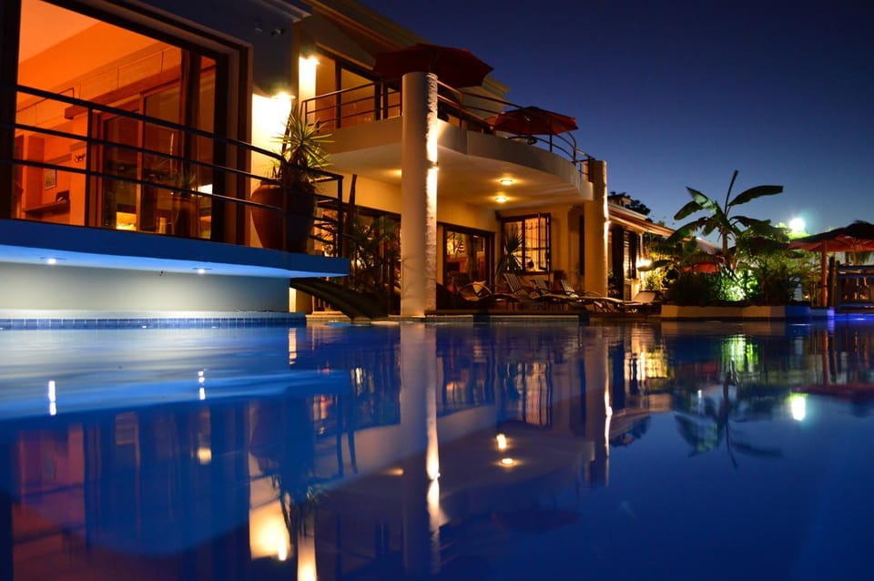 Property building, Night, Pool view, Swimming pool