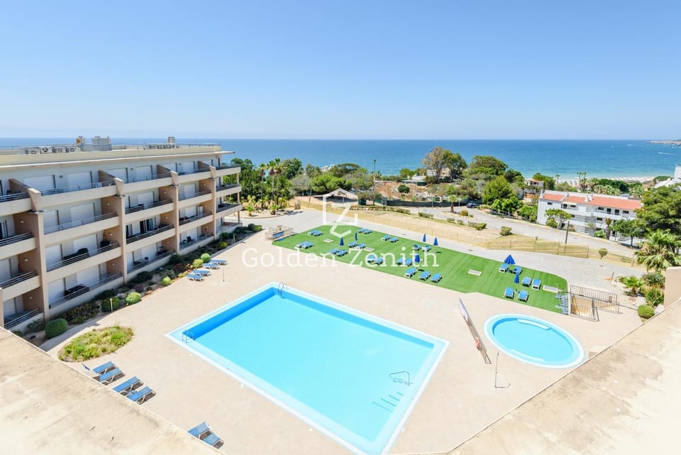 Property building, Beach, Pool view, Swimming pool