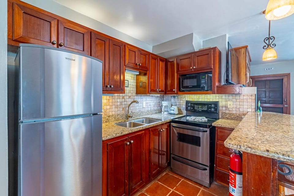 Kitchen or kitchenette, oven, stove, toaster