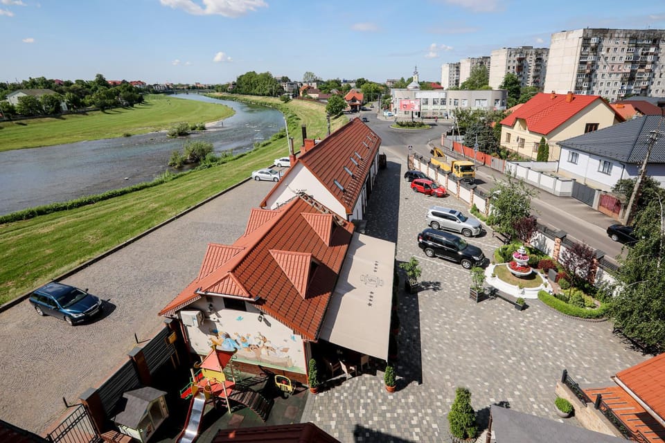 Property building, View (from property/room), Mountain view, River view, Street view
