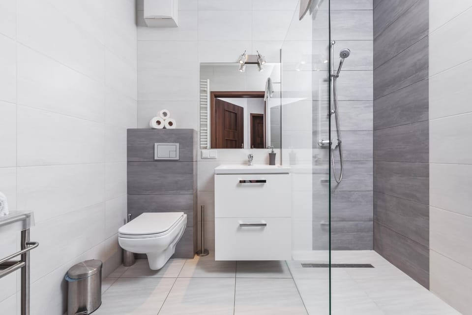 Shower, Toilet, Bathroom, hair dryier, towels