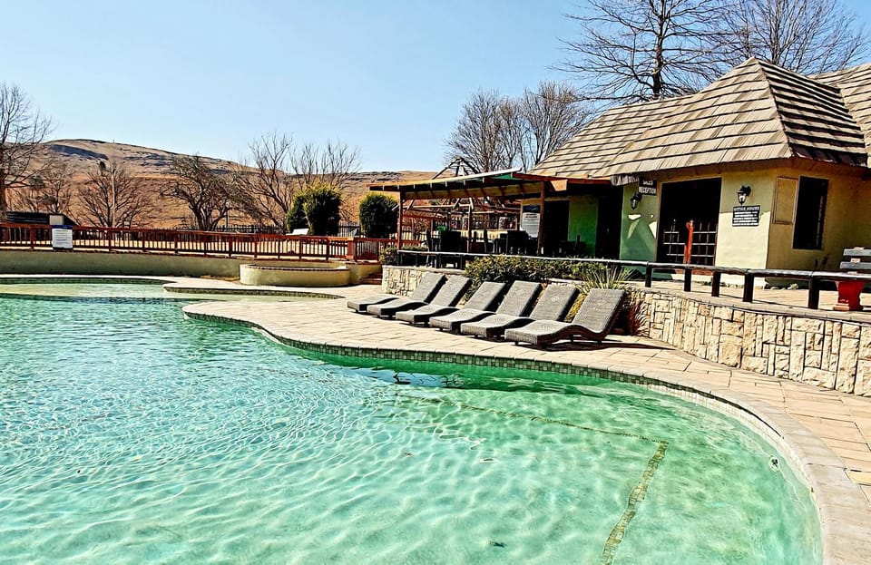 Patio, Day, Natural landscape, Pool view, Swimming pool, sunbed