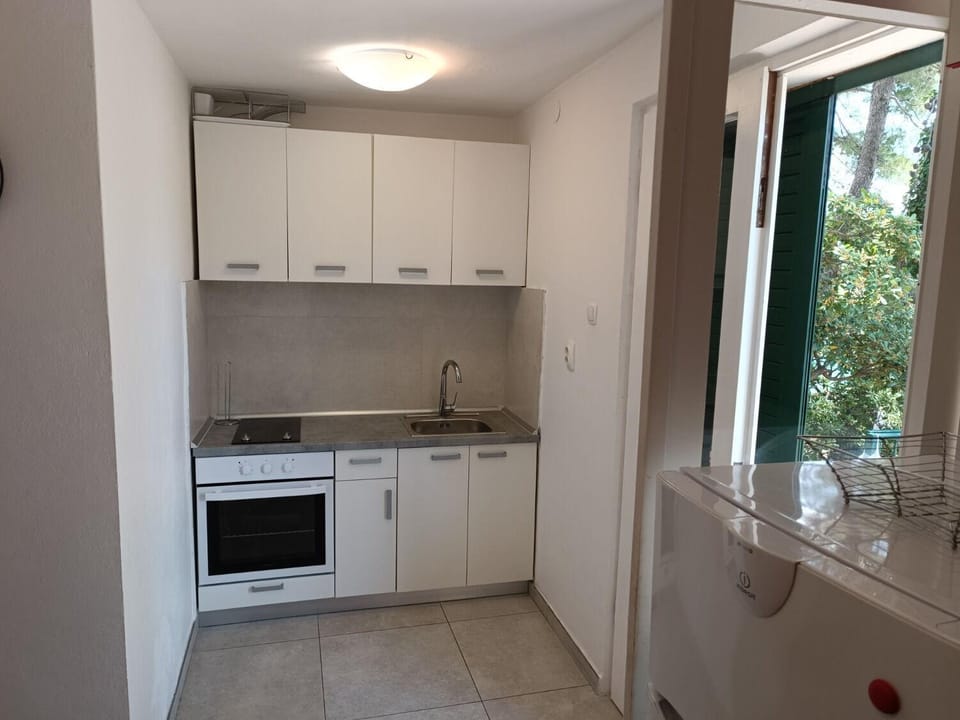 Kitchen or kitchenette, stove