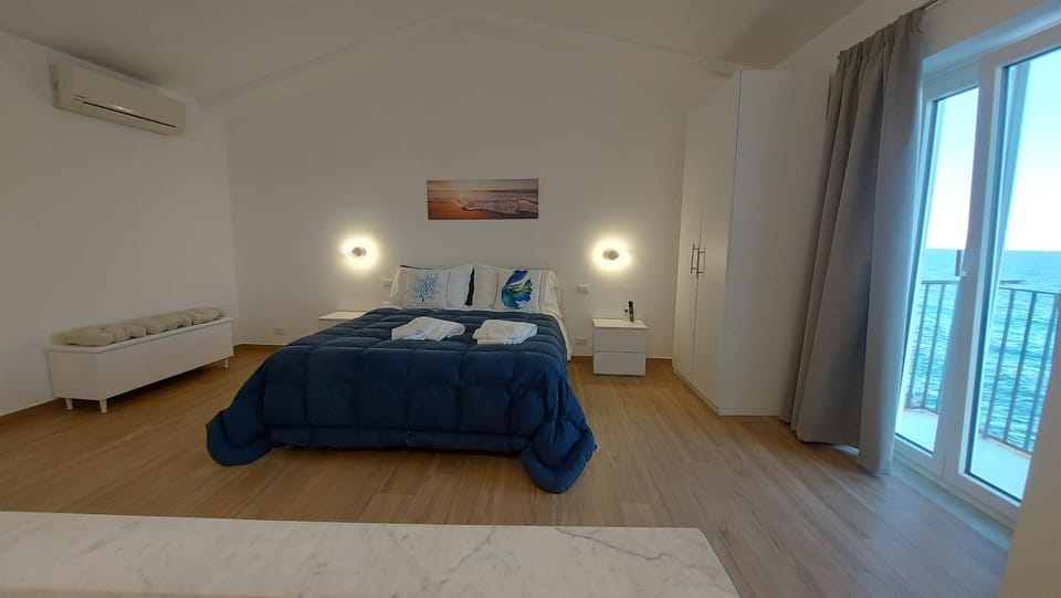 Bed, Photo of the whole room, Bedroom, towels, air conditioner