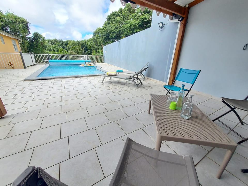 Swimming pool, sunbed