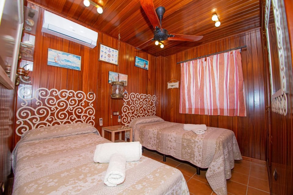 Bed, Photo of the whole room, Bedroom, fireplace, air conditioner