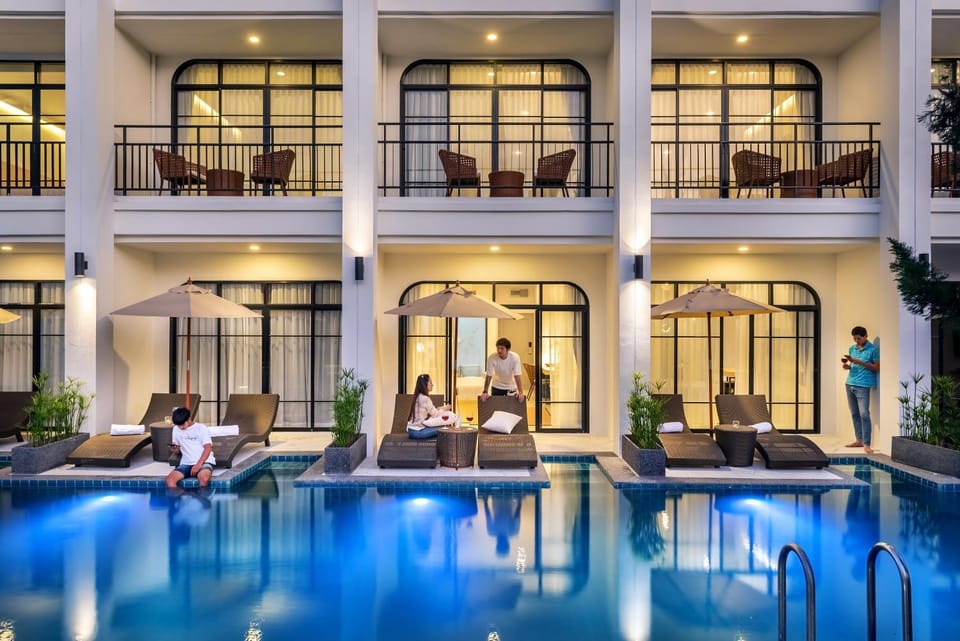 Patio, Pool view, Swimming pool, group of guests, sunbed