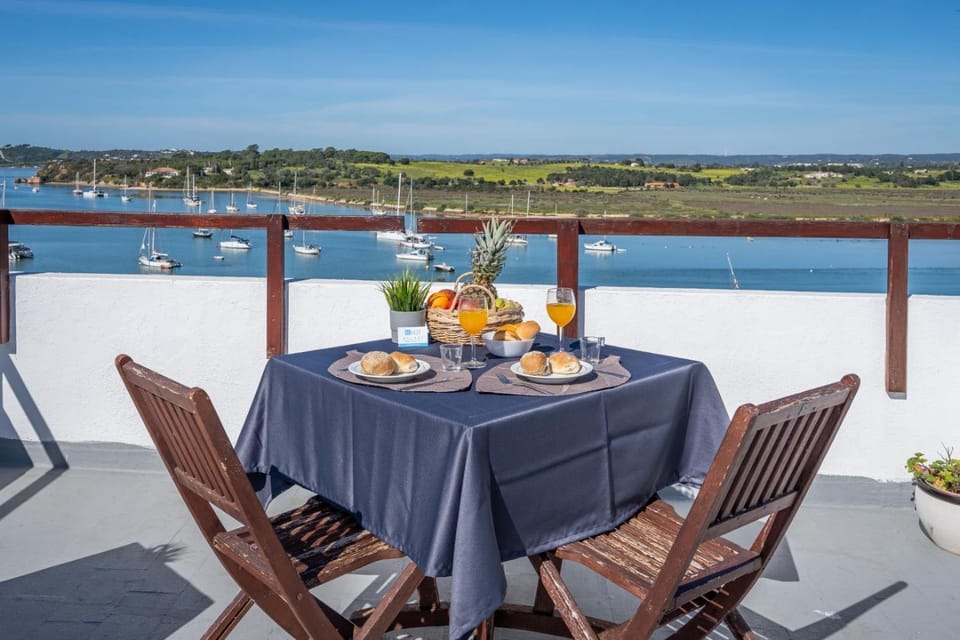 Patio, Spring, Day, People, Natural landscape, Winter, Summer, View (from property/room), Balcony/Terrace, Decorative detail, Decorative detail, Dining area, On site, Guests, River view, children, older children, group of guests, Family