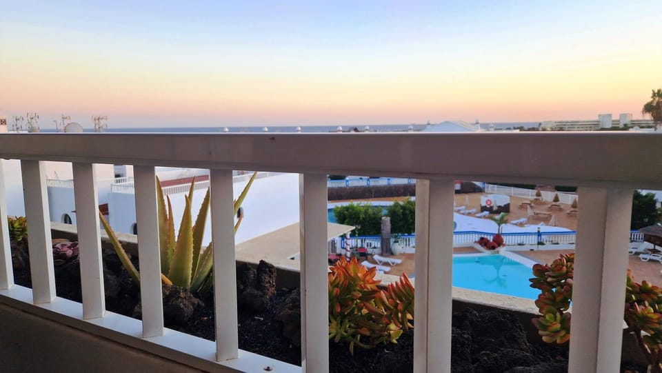 View (from property/room), Balcony/Terrace, Pool view, Sea view, Swimming pool, Sunrise