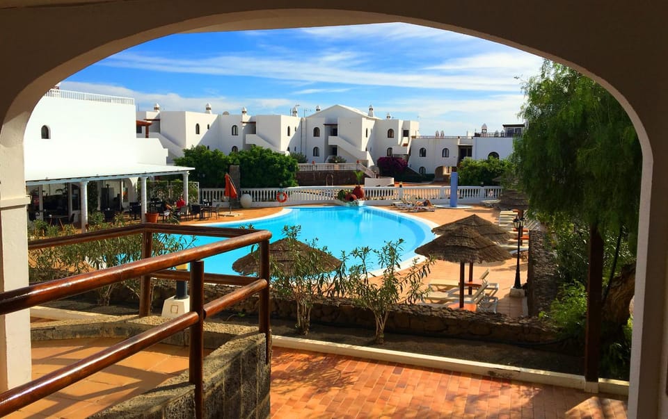 Property building, Day, Pool view, Swimming pool