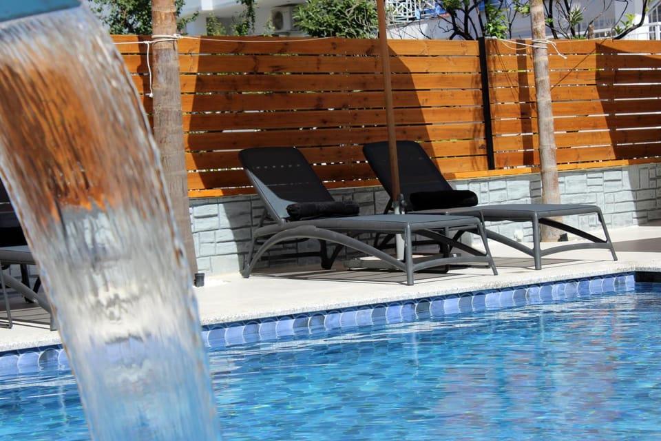 Swimming pool, sunbed