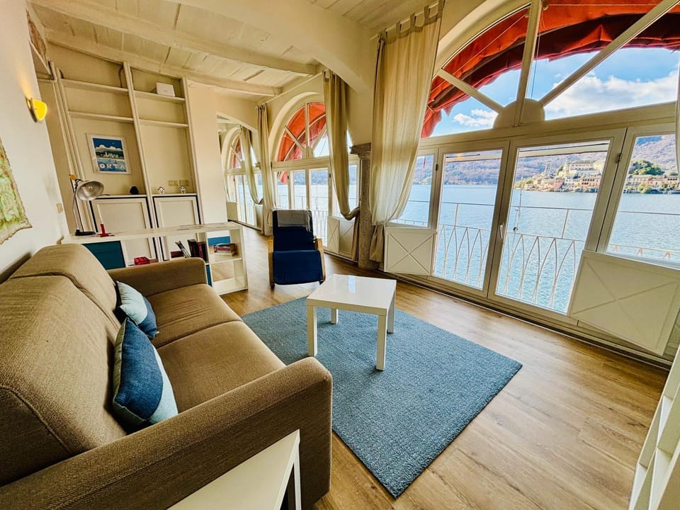 Natural landscape, View (from property/room), Living room, Seating area, Lake view