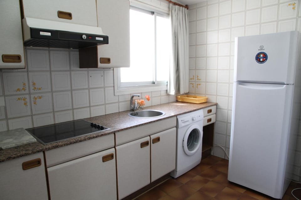 Kitchen or kitchenette, washing machine