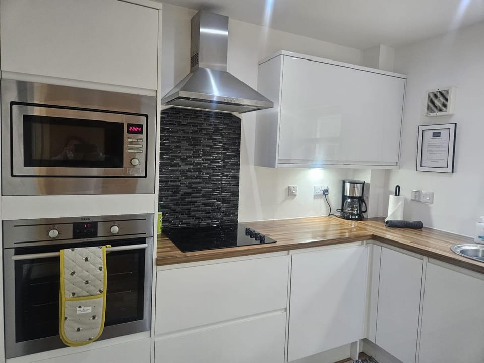 Kitchen or kitchenette, oven, stove, toaster