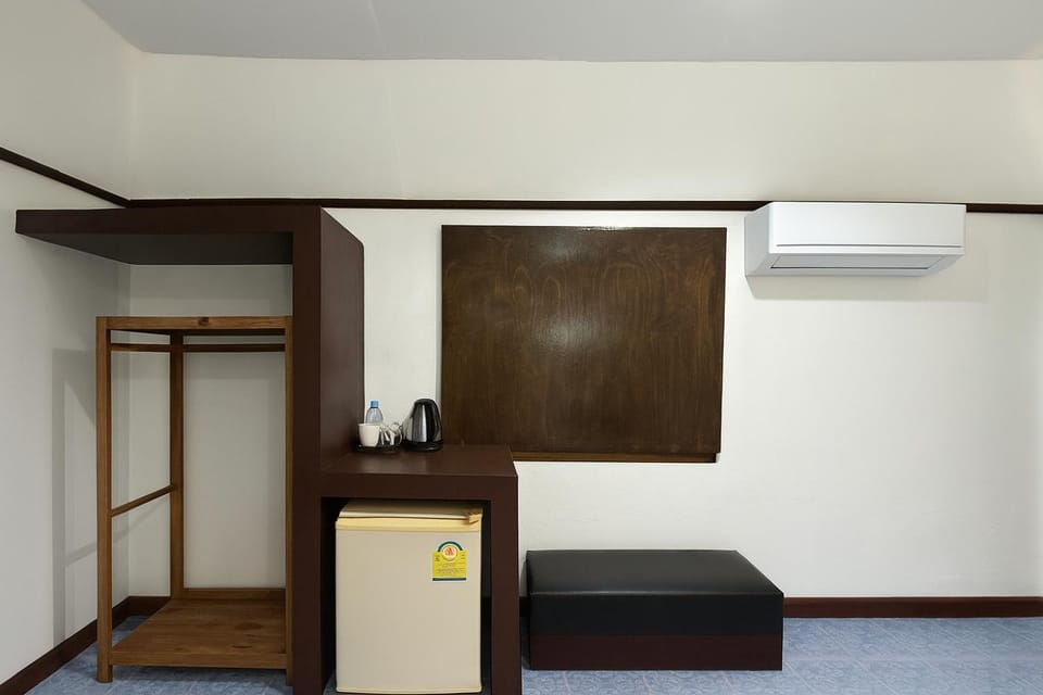 Photo of the whole room, minibar, air conditioner