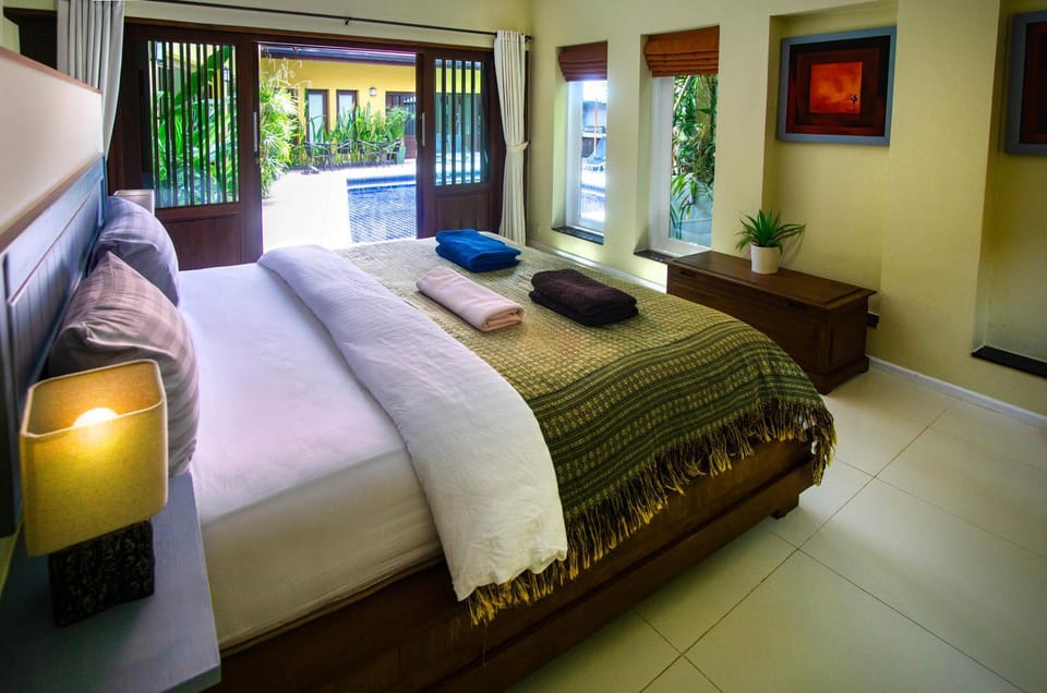 Bed, Bedroom, Pool view, towels, air conditioner