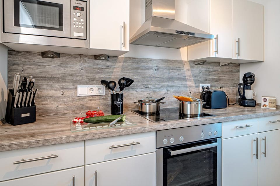 Kitchen or kitchenette, stove, toaster