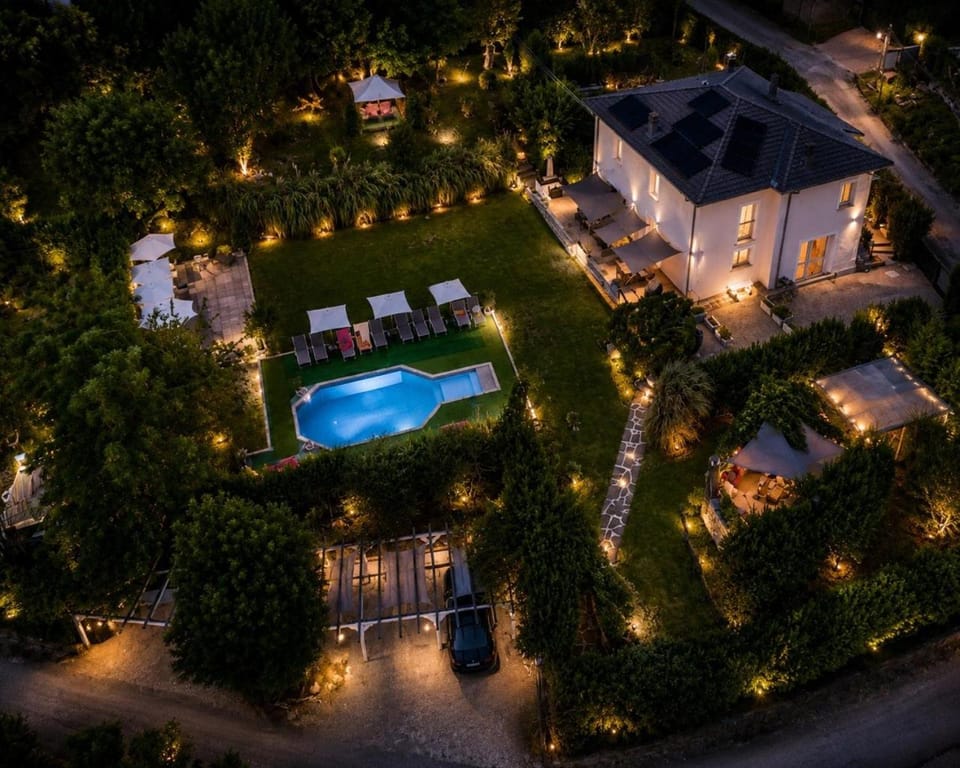 Property building, Night, Bird's eye view, Pool view, Swimming pool, Parking, sunbed