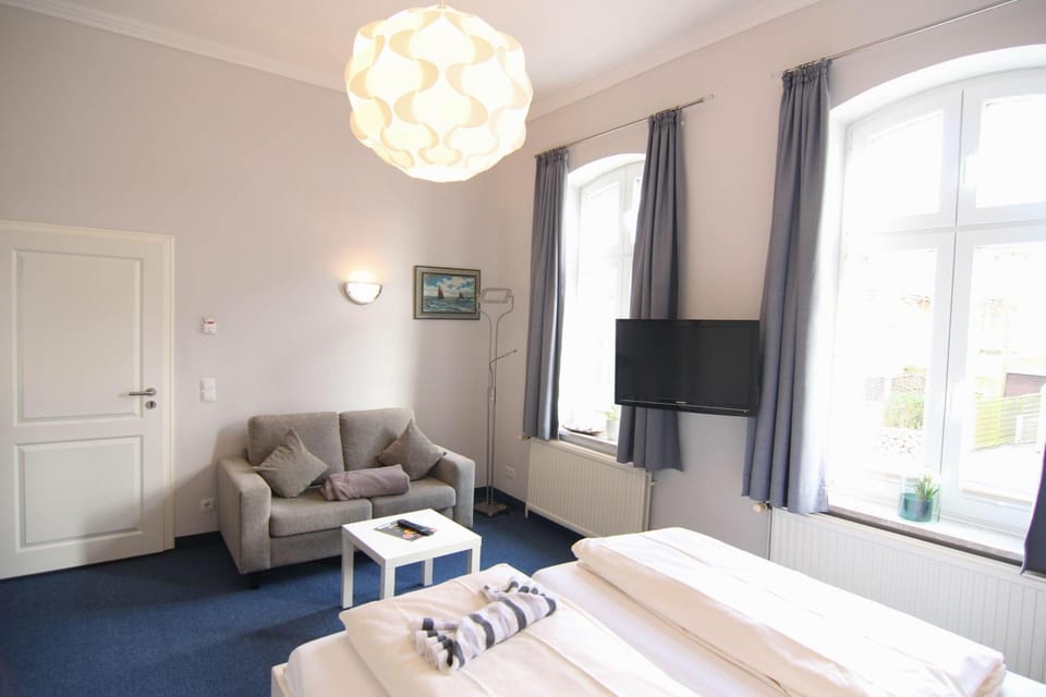 Kapitaenshaus-Lassen-Zimmer-Amistad Bed and Breakfast in Westerland