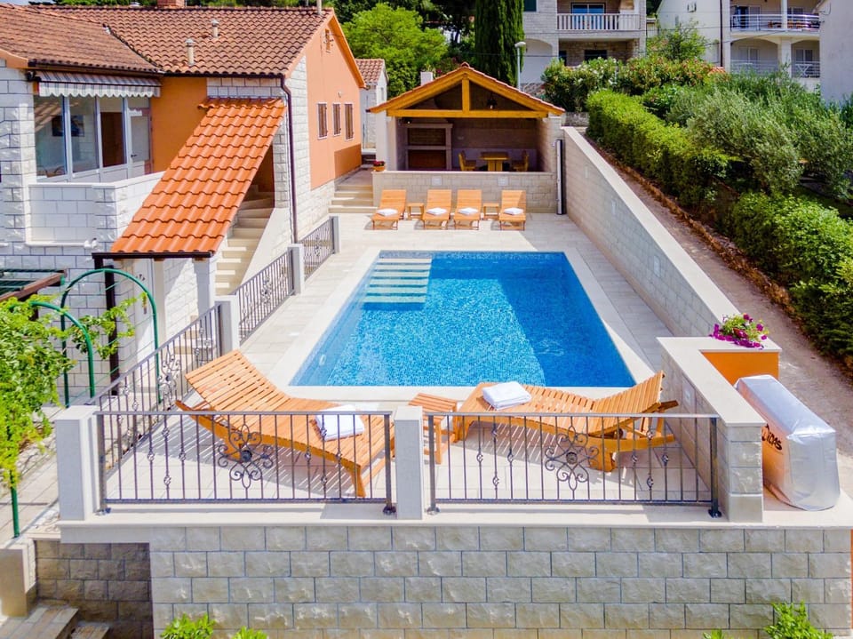 Property building, Pool view, Swimming pool, sunbed