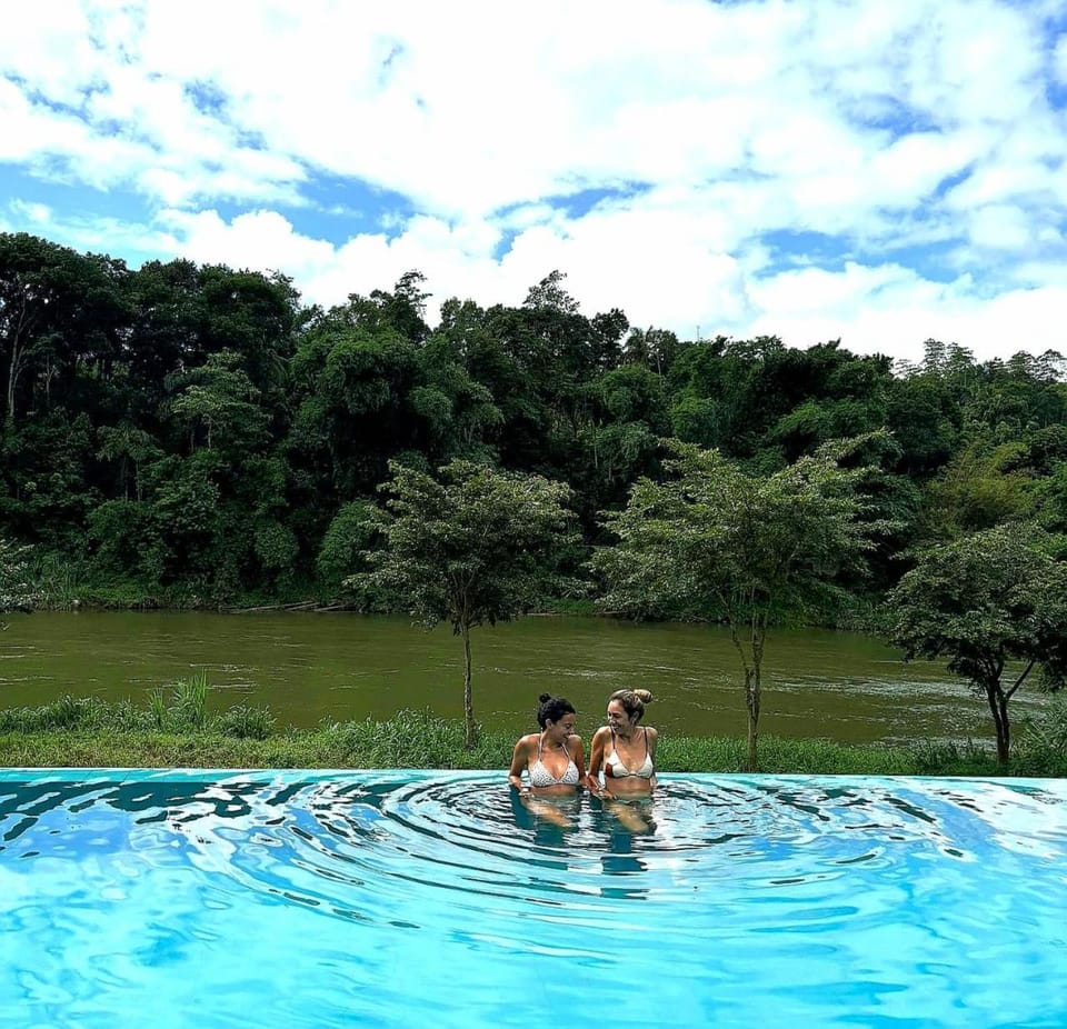 People, Natural landscape, Pool view, group of guests