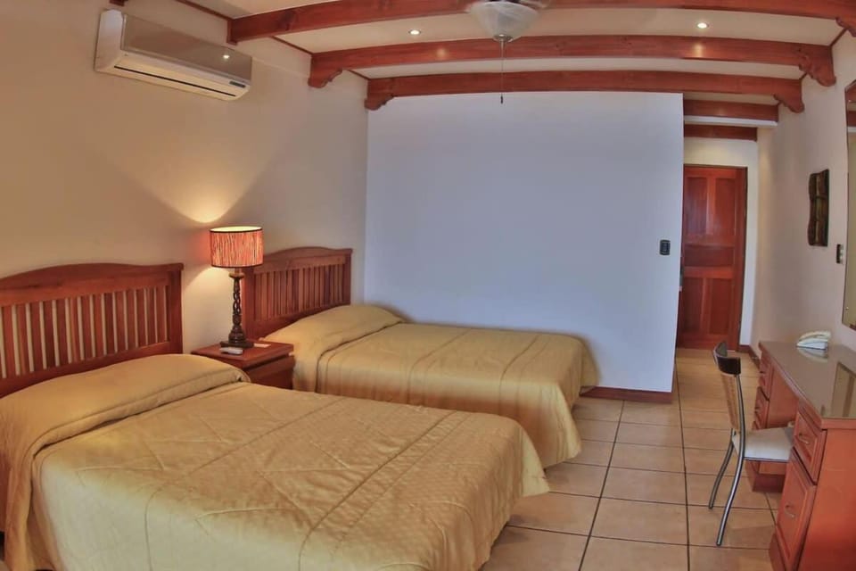 Oceanview Studio Apartment with Community Pool & Views of Flamingo Marina House in Playa Flamingo