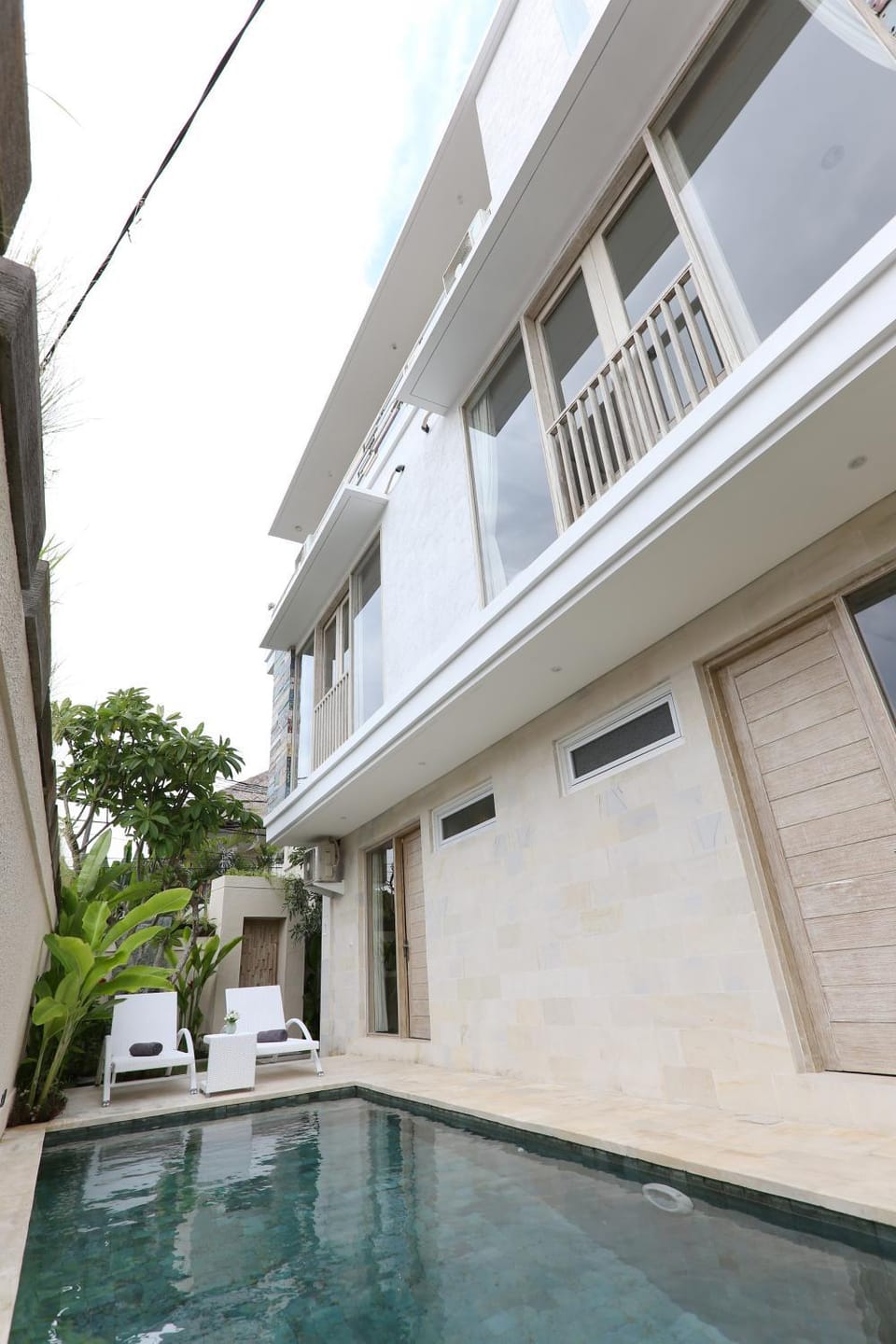 Property building, Pool view, Swimming pool, sunbed