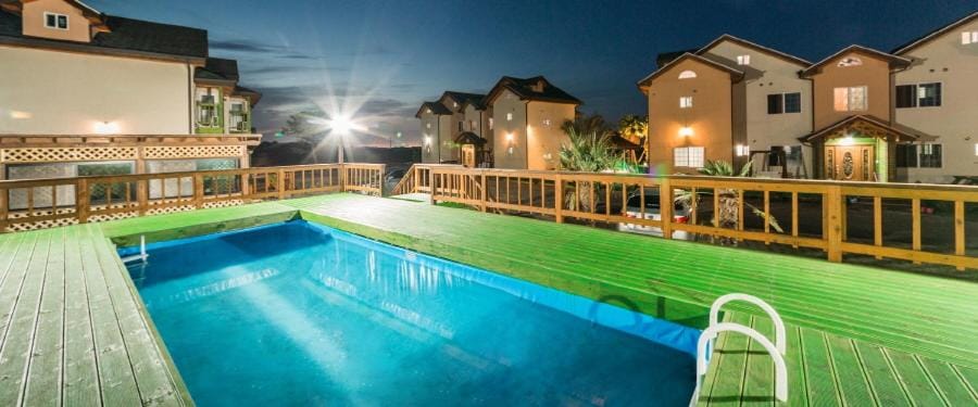 Property building, Night, Swimming pool