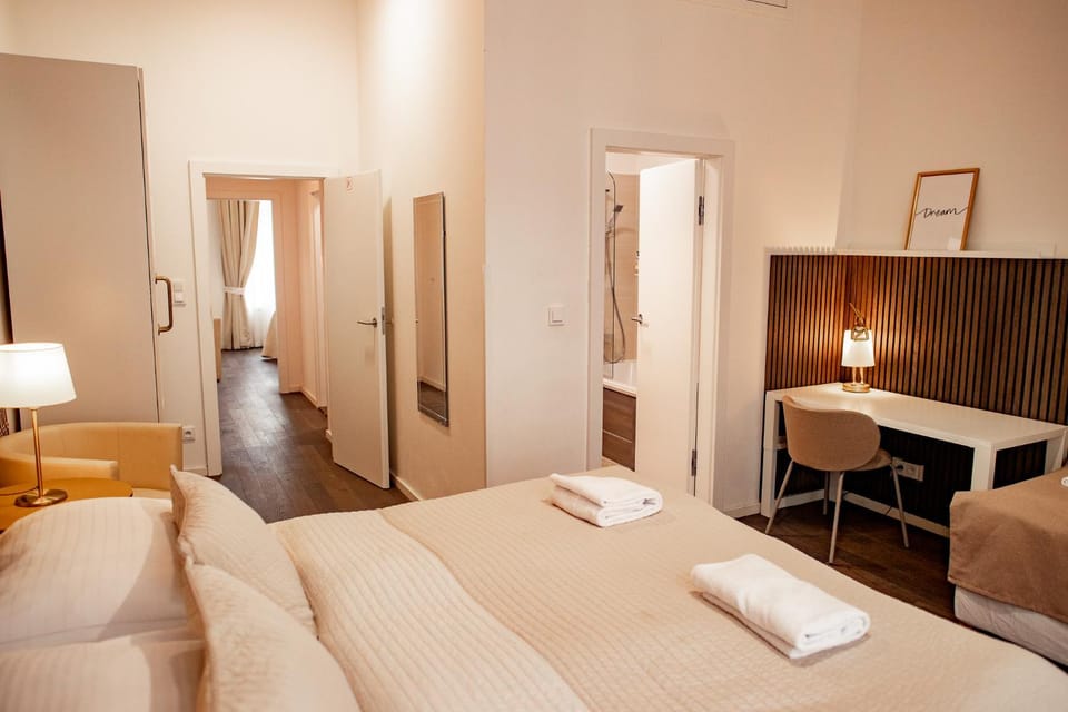 Bed, Photo of the whole room, Seating area, Bedroom, towels, wardrobe