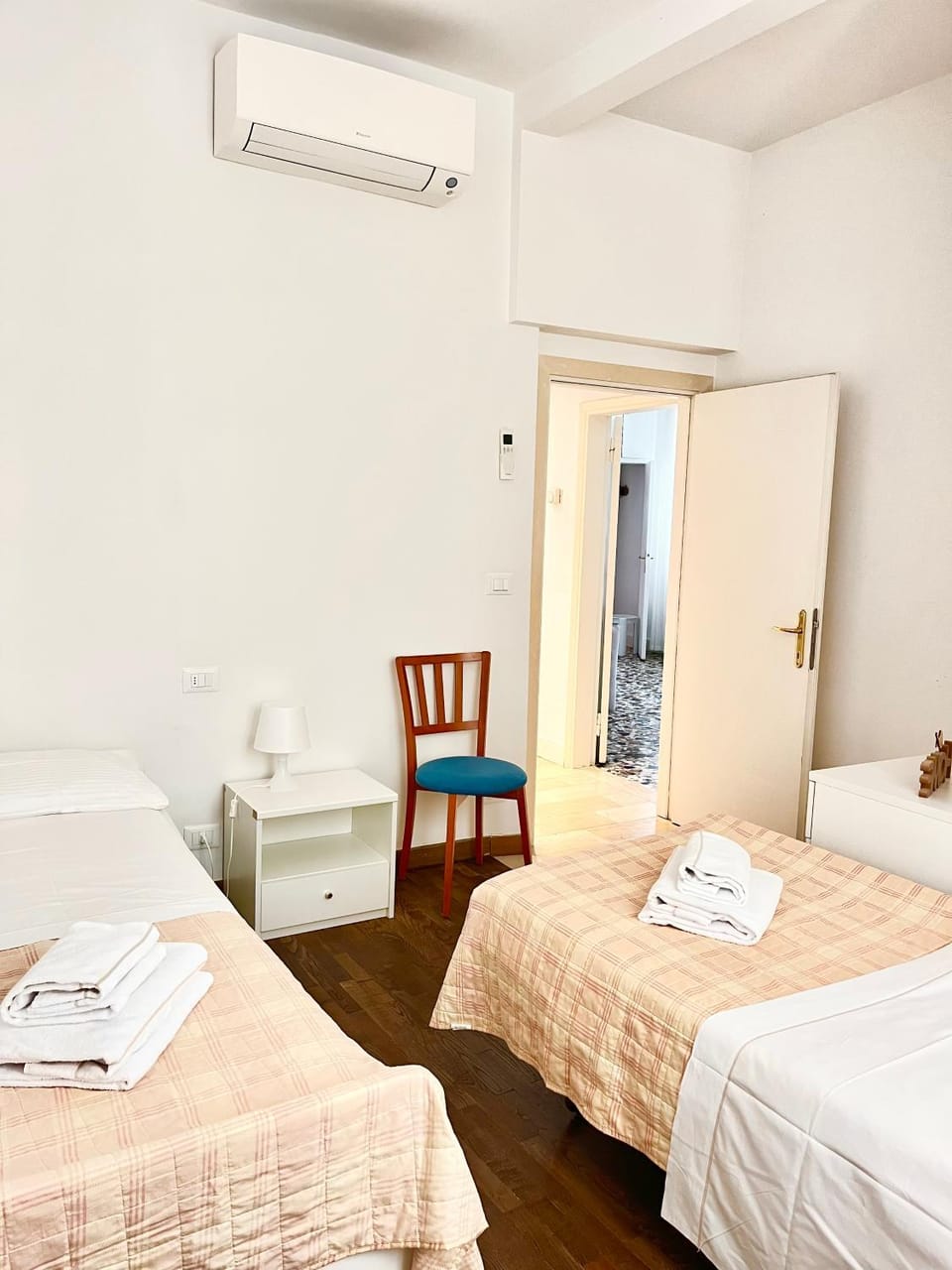 Bedroom, towels, wardrobe, air conditioner